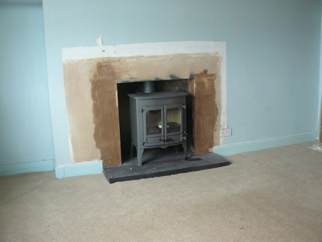 The second stove. Just a bit of painting and these rooms in the main house will be much improved.